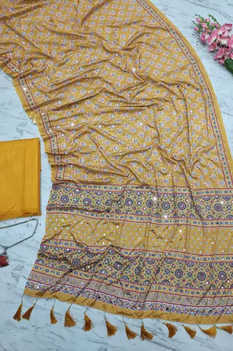 Beautiful yellow ajarakh print with real mirror work saree