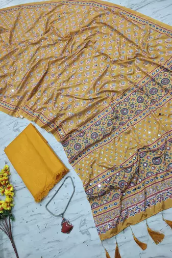 Beautiful yellow ajarakh print with real mirror work saree