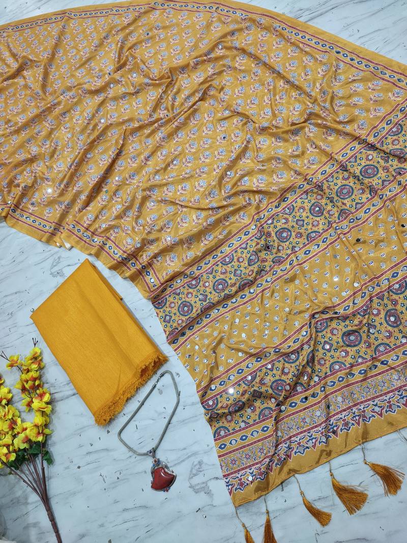 Beautiful yellow ajarakh print with real mirror work saree