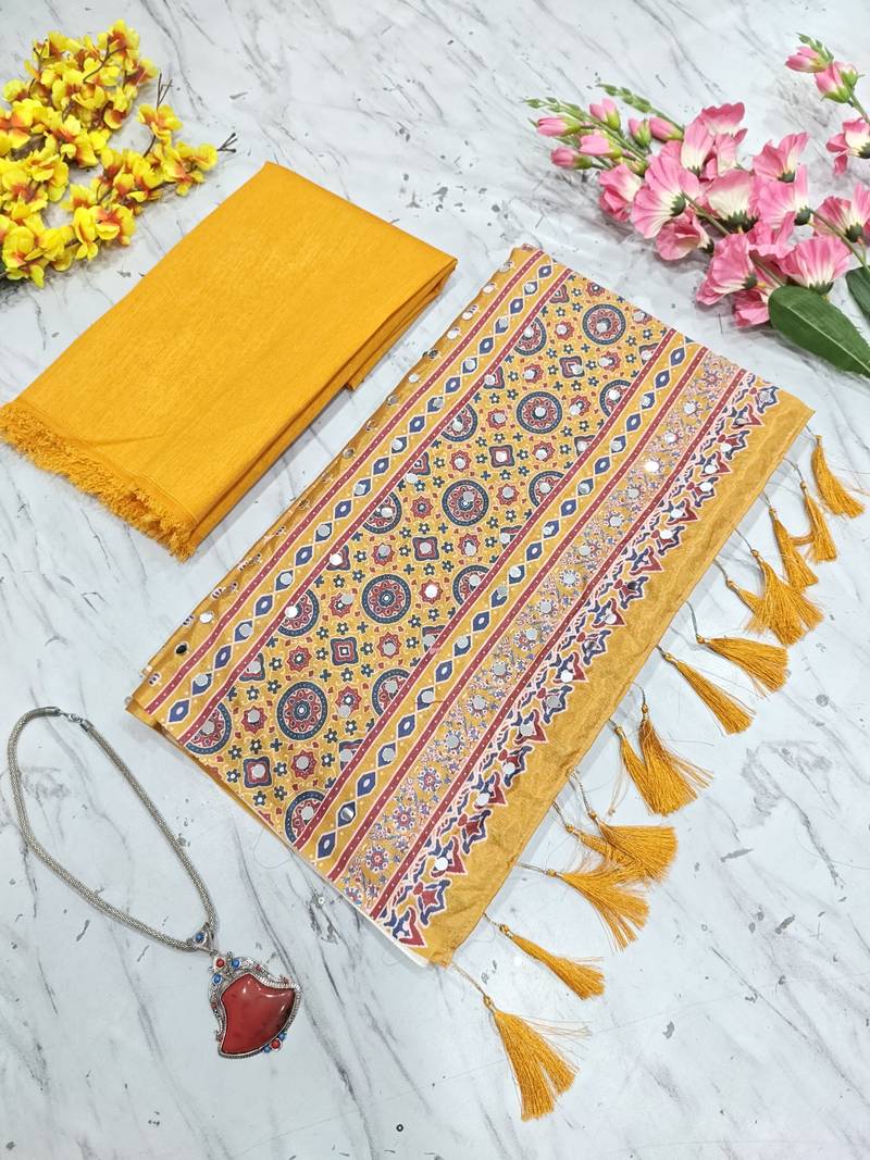 Beautiful yellow ajarakh print with real mirror work saree
