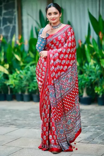Beautiful maroon ajarakh print with real mirror work saree