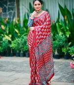 Beautiful maroon ajarakh print with real mirror work saree