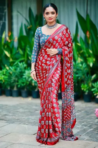 Beautiful maroon ajarakh print with real mirror work saree