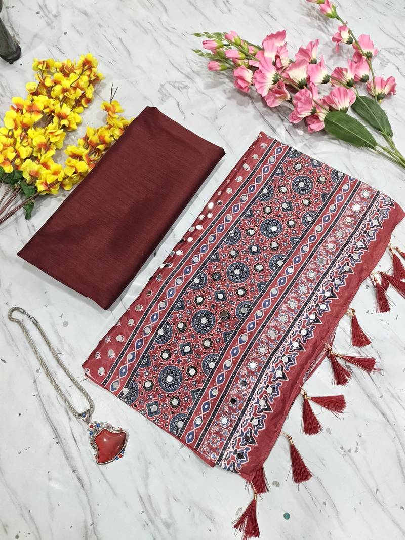 Beautiful maroon ajarakh print with real mirror work saree