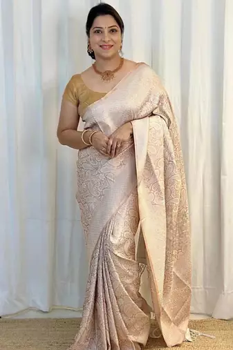Champagne silk blend zari woven woven saree