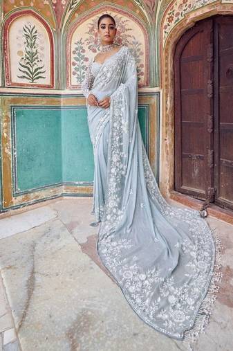 Graceful sky blue  georgette embroidery work saree