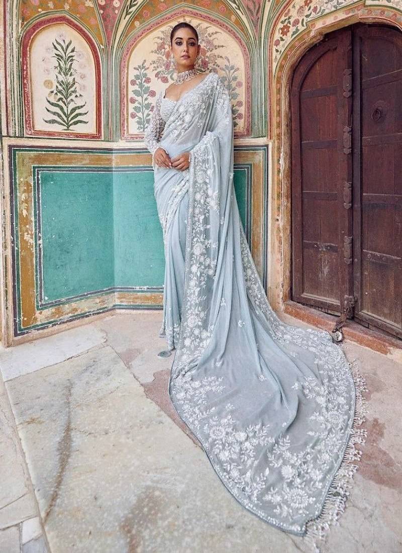 Graceful sky blue  georgette embroidery work saree