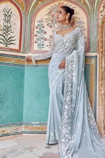 Graceful sky blue  georgette embroidery work saree