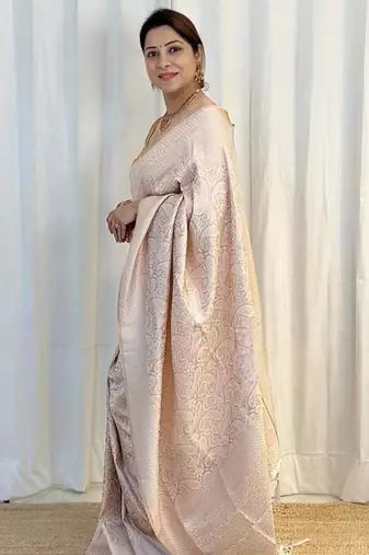 Champagne silk blend zari woven woven saree