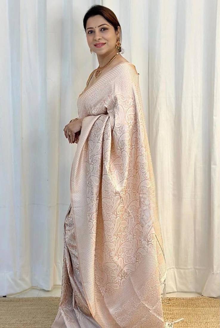 Champagne silk blend zari woven woven saree
