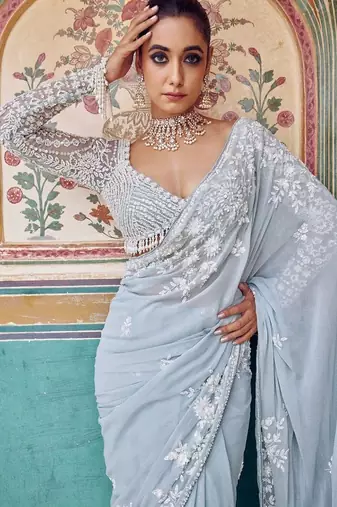 Graceful sky blue  georgette embroidery work saree
