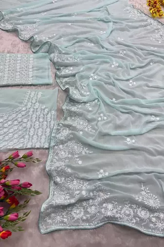 Graceful sky blue  georgette embroidery work saree