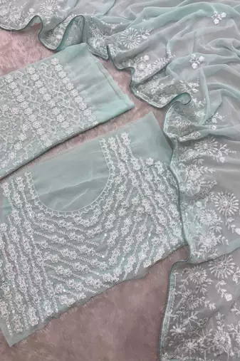 Graceful sky blue  georgette embroidery work saree
