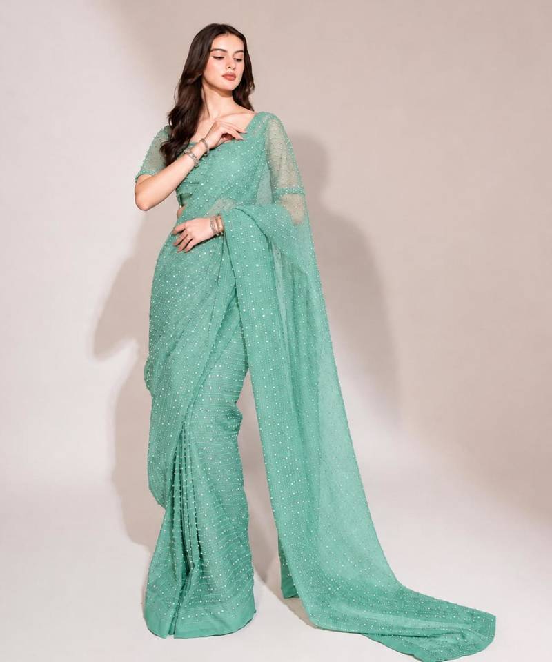 Sea green georgette stone work embroidered saree