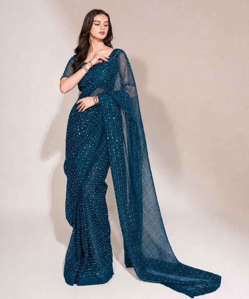 Teal georgette stone work embroidered saree