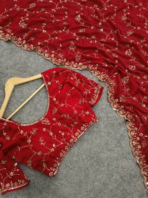 Elegant red embroidered saree 5