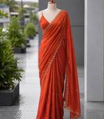 Orange satin sequins work embroidered saree