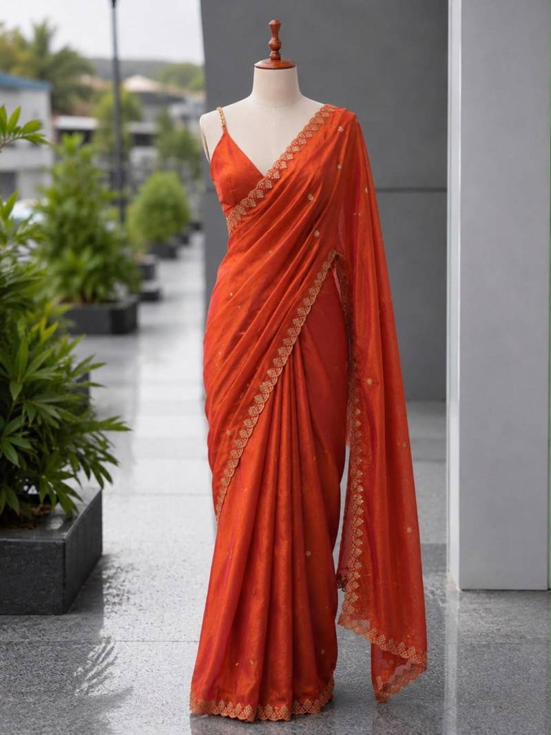 Orange satin sequins work embroidered saree