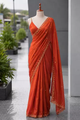 Orange satin sequins work embroidered saree