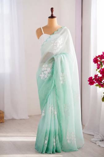 Light green silk blend sequins work embroidered saree