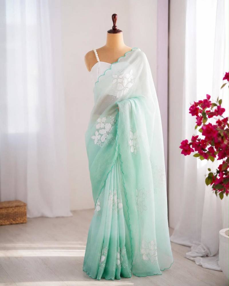 Light green silk blend sequins work embroidered saree