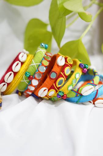  handcrafted multicolour boho thread bangle set with cowrie shells & mirrors