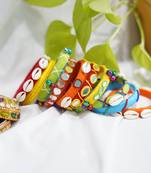  handcrafted multicolour boho thread bangle set with cowrie shells & mirrors
