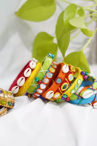  handcrafted multicolour boho thread bangle set with cowrie shells & mirrors