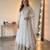 White georgette embroidered flared gown set