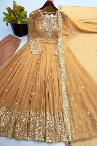 Beige georgette embroidered flared gown set