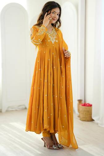 Dark-yellow faux georgette embroidered flared gown set