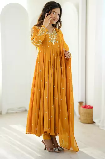 Dark-yellow faux georgette embroidered flared gown set