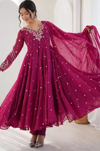 Magenta faux georgette embroidered flared gown set