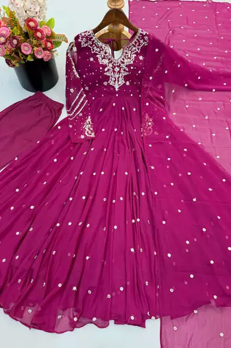 Magenta faux georgette embroidered flared gown set
