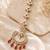 Mehendi gold oxidsed plated red american diamond maang tikka