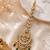 Mehendi gold oxidsed plated green american diamond maang tikka