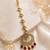 Mehendi gold oxidsed plated red american diamond maang tikka