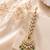 Mehendi gold oxidsed plated green american diamond maang tikka