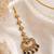 Mehendi gold oxidsed plated green american diamond maang tikka
