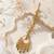 Mehendi gold oxidsed plated green american diamond maang tikka