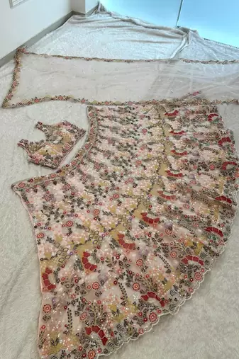 peach net embroidered traditional lehenga choli
