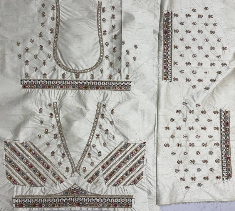 white color Gotta Pati Dori and Zari Embroidered Multi Thread and Sequins work silk blend Lehenga Choli set