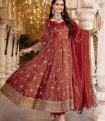 Rust heavy embroidered anarkali suit with pant & dupatta