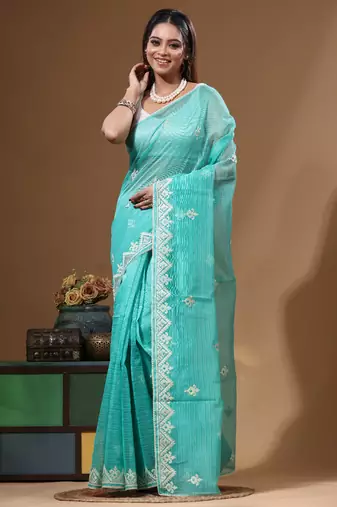 Sea green supernet with embroidery saree with blouse piece