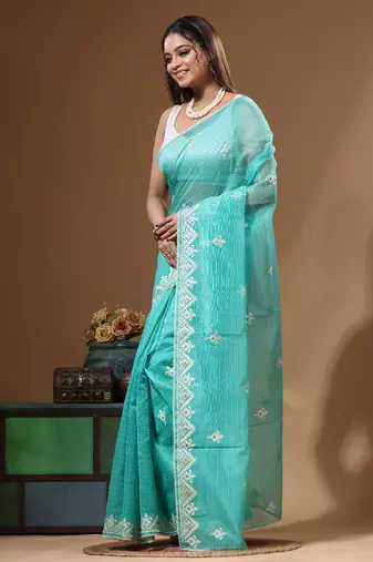 Sea green supernet with embroidery saree with blouse piece