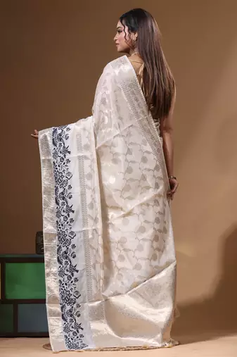 off-white jacquard with embroidery saree with blouse piece