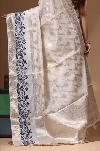 off-white jacquard with embroidery saree with blouse piece