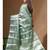 green silk blend saree with blouse piece