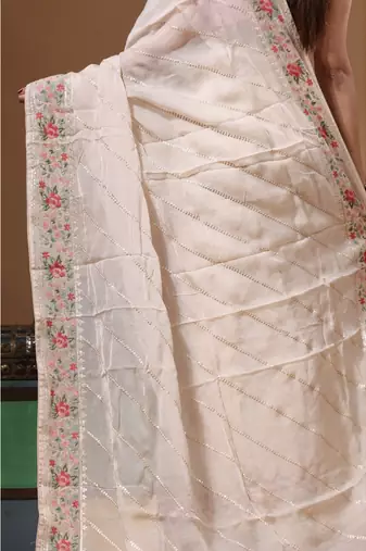 Cream viscose organza with embroideery saree with blouse piece