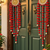 handmade red pom pom beads hanging with golden bells decorative wall hanging for home decoration (pack of 2)